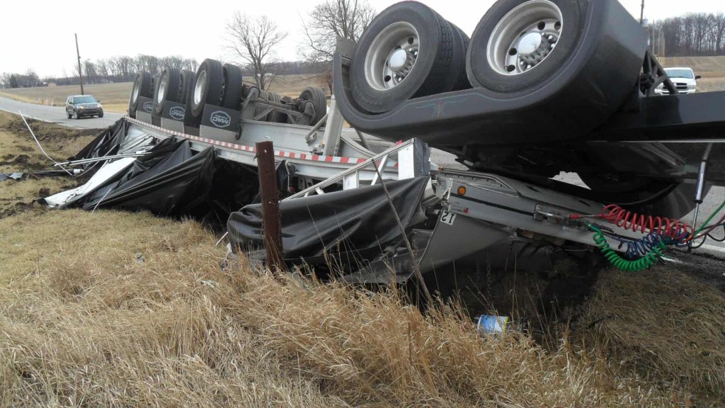 Driver injured after rolling semi crash in DeKalb County - WOWO News ...