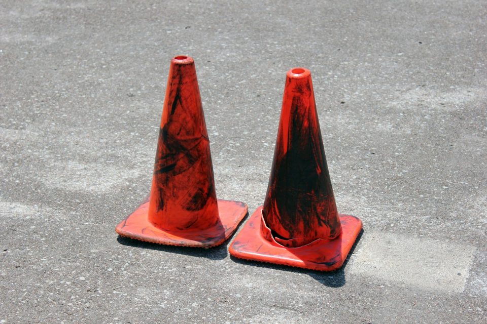 two red traffic cones