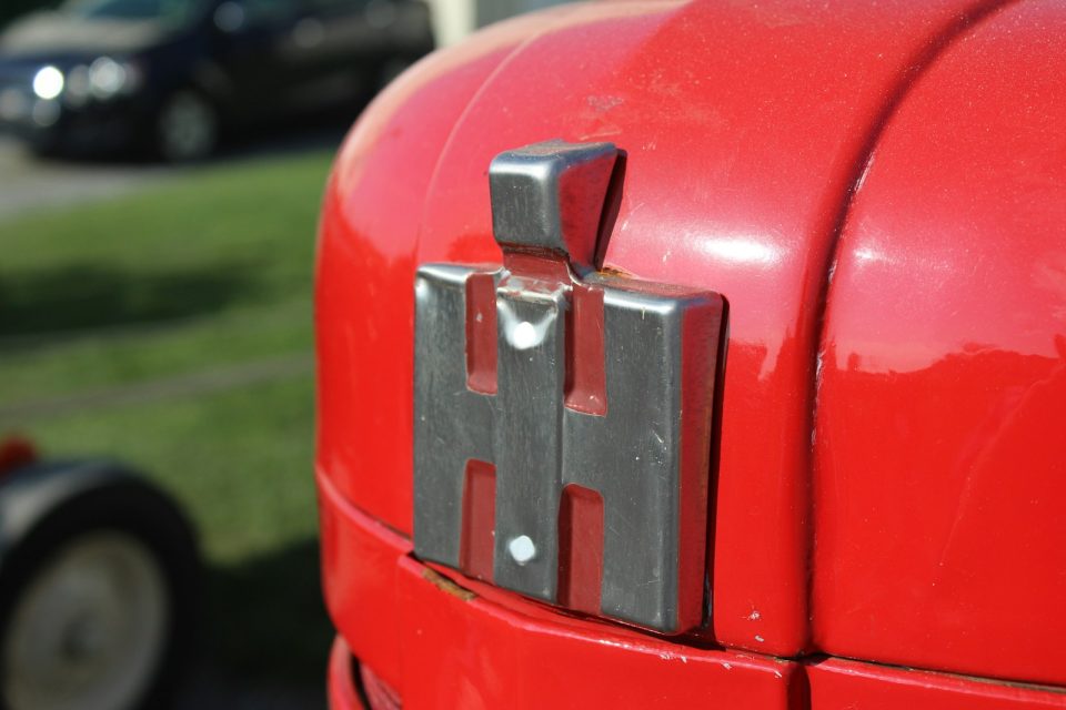 red and black plastic tool