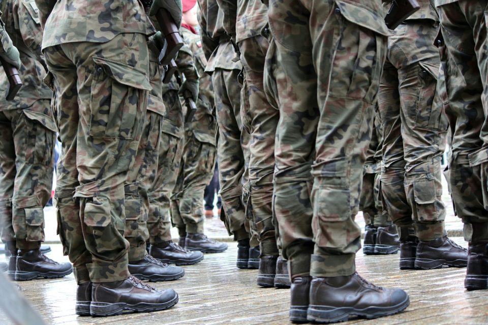 a group of military men standing next to each other