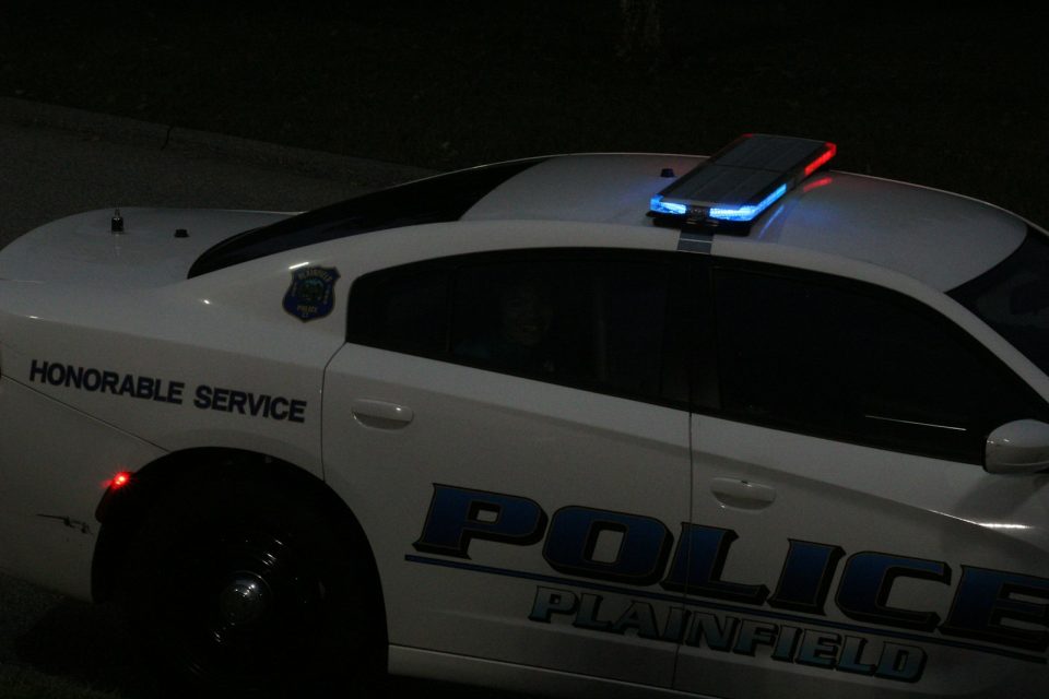 a police car parked on the side of the road