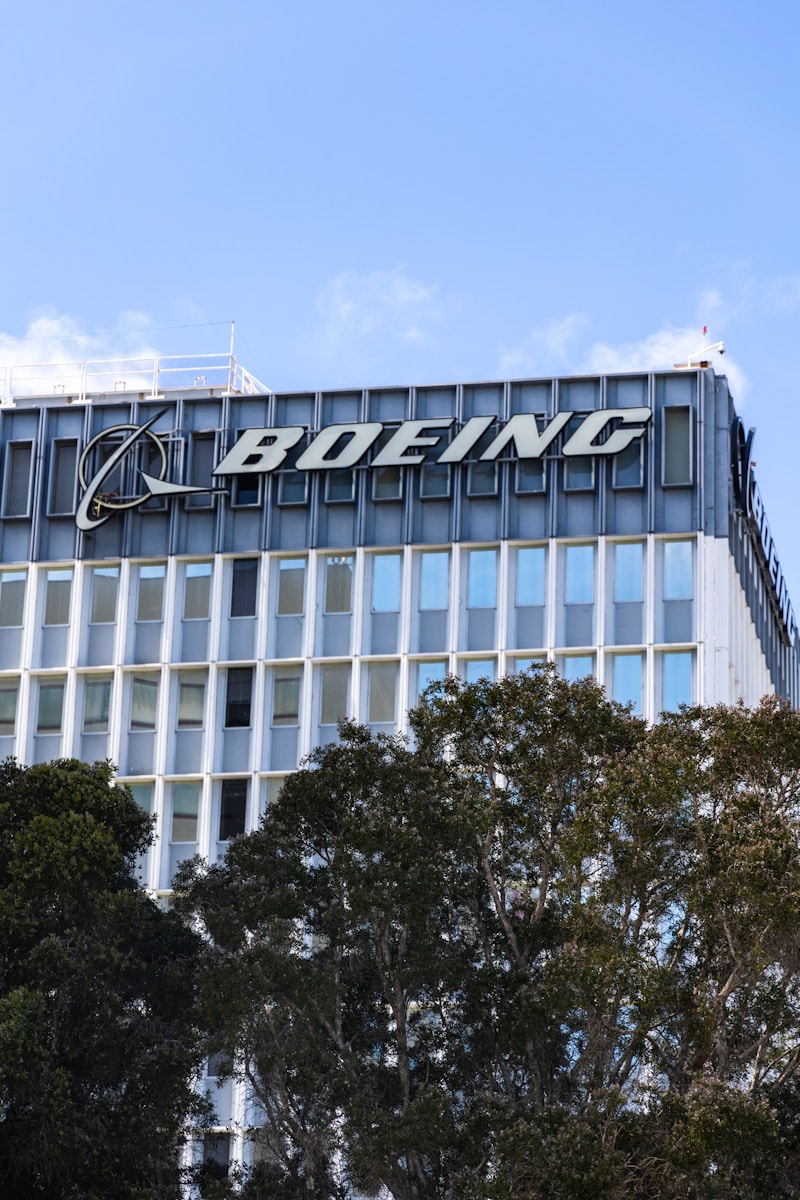 a tall building with a sign on top of it