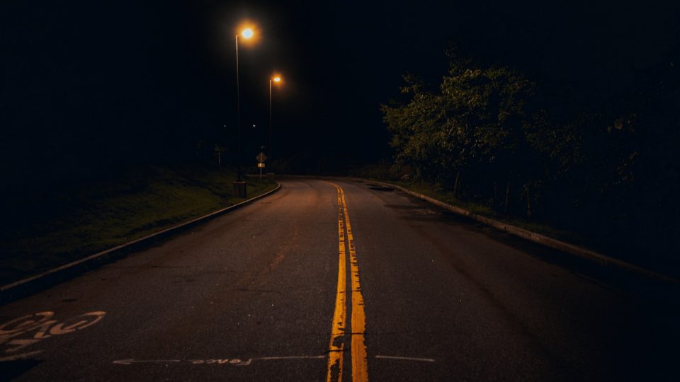 black asphalt road during night time